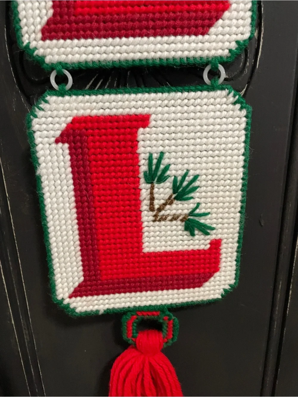 Handmade plastic canvas needlepoint NOEL Christmas hanging decoration.